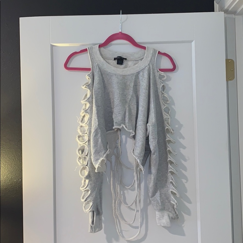 Cropped, distressed, sweatshirt.